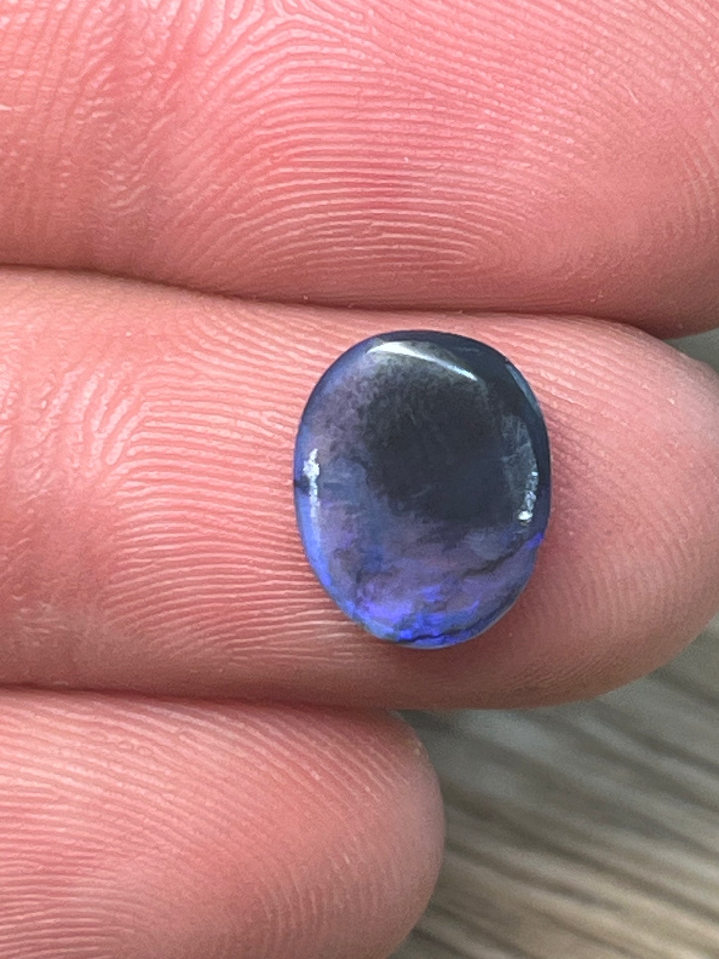 Lightning Ridge 2.10ct dark crystal with blue and purple flashes
