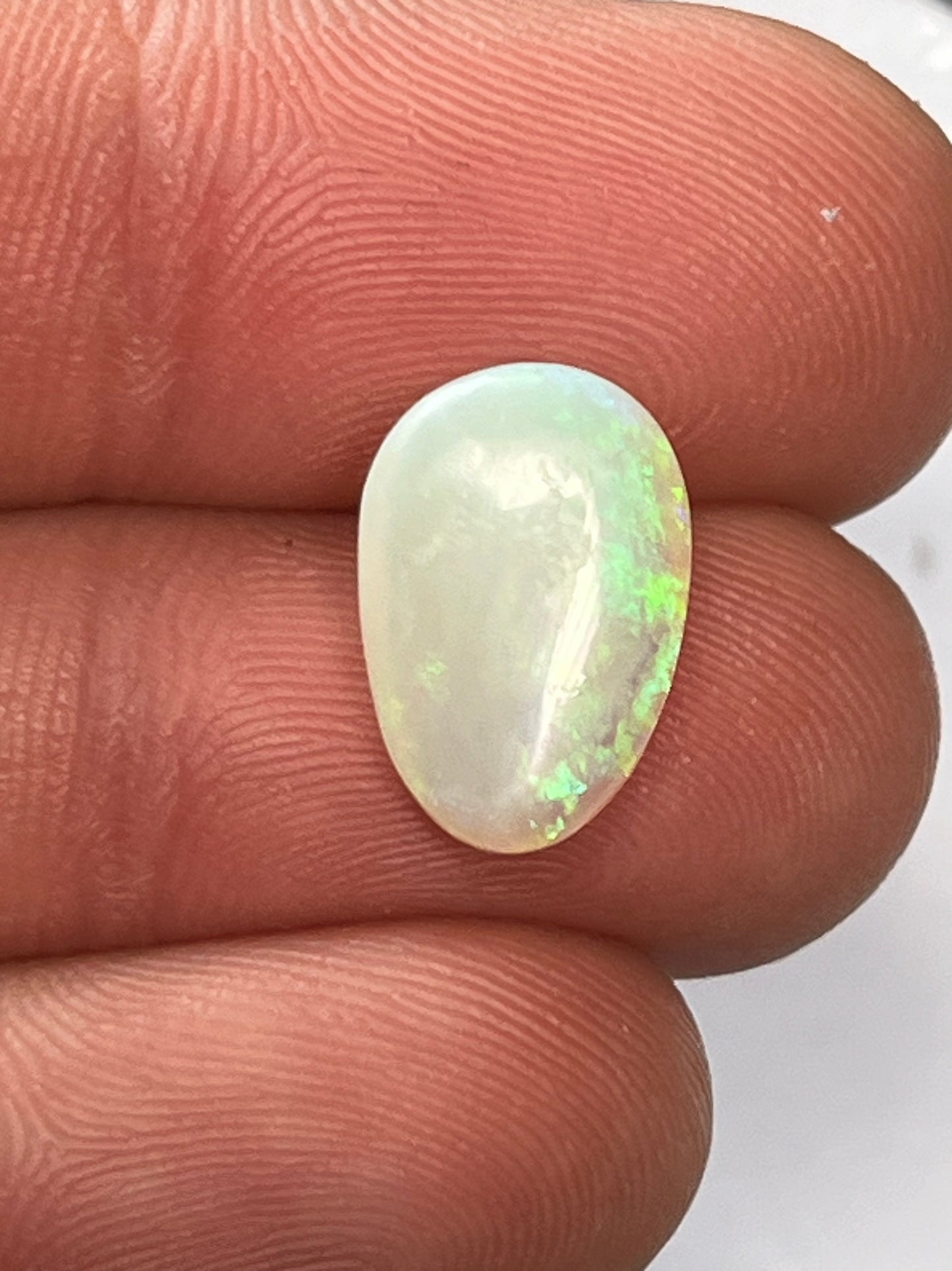 Lightning Ridge 4ct crystal with green and blue flashes freeform